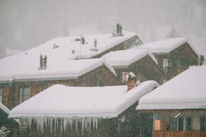 Snow on Roofs: The Importance of Removal & When to Act